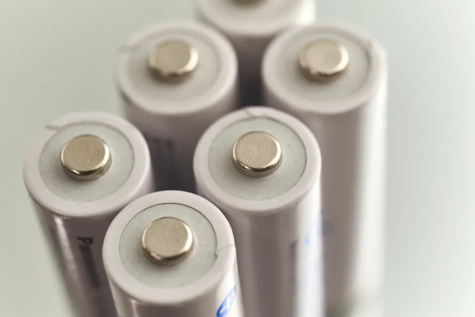 Close view of rechargeable battery cells standing upright